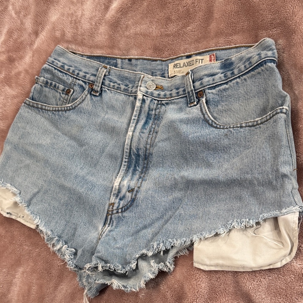 Levi’s relaxed fit 550 distressed cutoff denim shorts